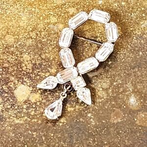 Art Deco Era Rhinestone Brooch "Chaton" Unsigned Clear Prism Ribbon Dangle 2"